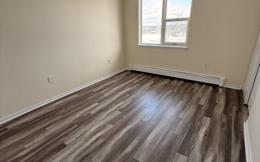 5511 Charles Street | Large 2-Bedroom Corner Unit with Balcony | Unit 310 | $1,950/Month – Available July 1st, 2026